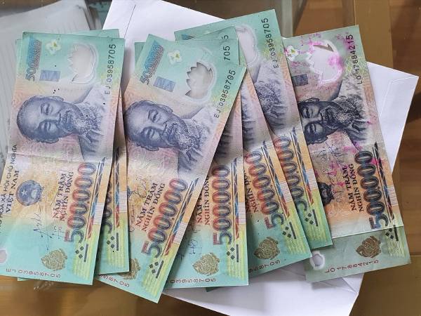 Mẹo hóa giải vận hạn khi nằm mộng thấy tiền giả